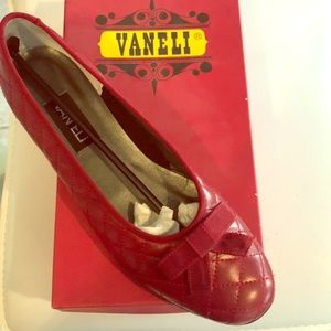 Vaneli Never been worn ruby red flats. 9.5 Narrow